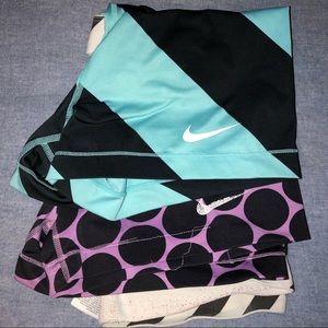 2 pairs of Nike pro spandex size Large